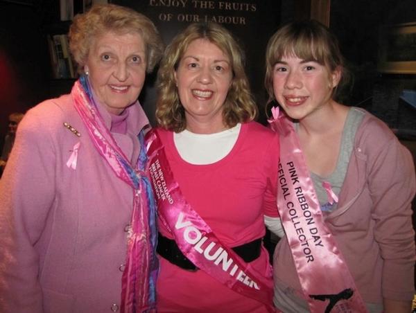 Julie Hughes (centre) with her late mother Alma Stephenson (L) and daughter Megan (R) collecting for the Pink Ribbon Street Appeal in 2011.  